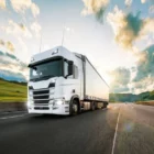 depositphotos_302317902-stock-photo-truck-with-container-on-road